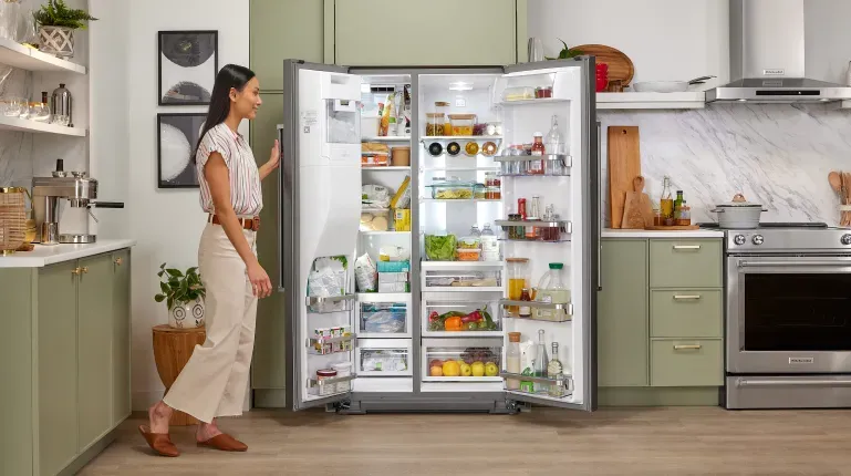 kitchenaid-refrigerator-woman-opening-fridge